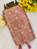 Dusty Rose Pink Floral Tissue Saree – folded view showing floral Jaal work and tassels