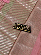 Dusty Rose Pink Floral Tissue Saree – close-up of fabric texture with Adhila logo