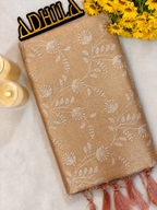 Terracotta Orange Floral Tissue Saree – folded view showing floral Jaal work and coordinated tassels