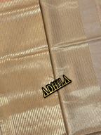 Grey Floral Tissue Saree – close-up of zari striped pallu with Adhila logo
