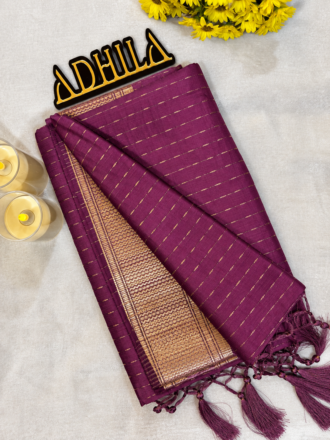Wine Purple Dola H/O Slub Saree with Chex Satin Border and tassel detailing