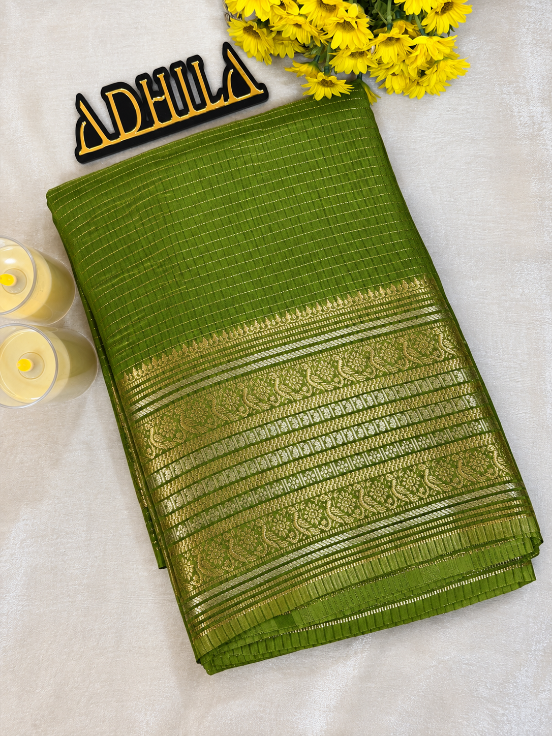 Viscose Mangalgiri Saree Olive Green – folded view showing zari check body and woven border